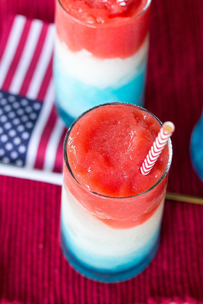 Celebrate the USA with this patriotic adult beverage! This Red, White & Blue Boozy Slush is the perfect addition to your party!